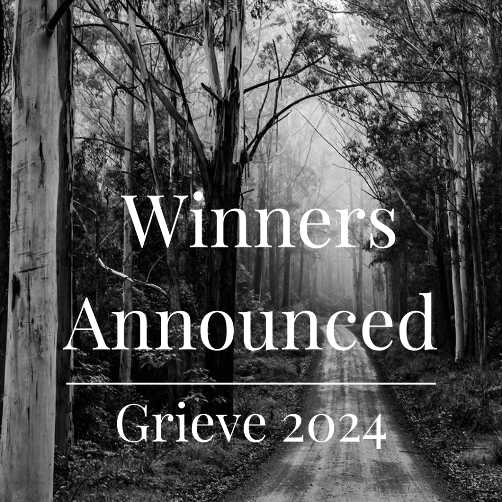 The image features a black and white photograph of a narrow dirt path cutting through a dense forest, with tall, leafless trees lining both sides. The scene is shrouded in mist. The text "Winners Announced, Grieve 2024".