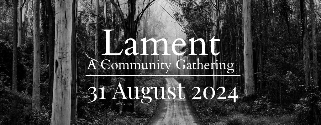 “Lament: A Community Gathering, 31 August 2024" text overlay on a black and white image of a misty forest path surrounded by tall trees.